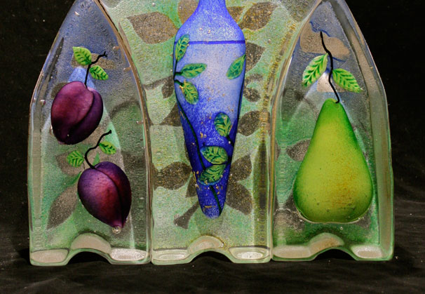 <i>Bacchus Triptych</i>, 2011; 14 x 14 x 4 inches; assembled sand cast glass with sculpted and painted inclusions