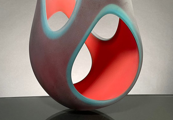 <i>VermiLán Dilation</i>, 2021; 18 x 12 x 6 inches; blown and hot sculpted glass, cement base 