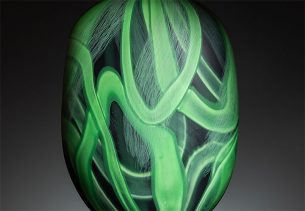 <i>Canopy, Layered Life #5</i>, 2026; 19 x 14 x 8 inches; blown glass with cane drawn additions, sandblasted, and pumice polished