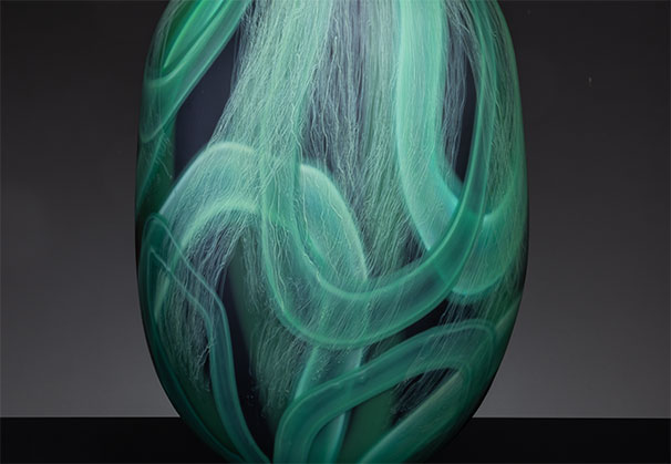 <i>Canopy, Layered Life, #6</i>, 2026; 15.75 x 11 x 6 inches; blown glass with cane drawn additions, sandblasted, and pumice polished