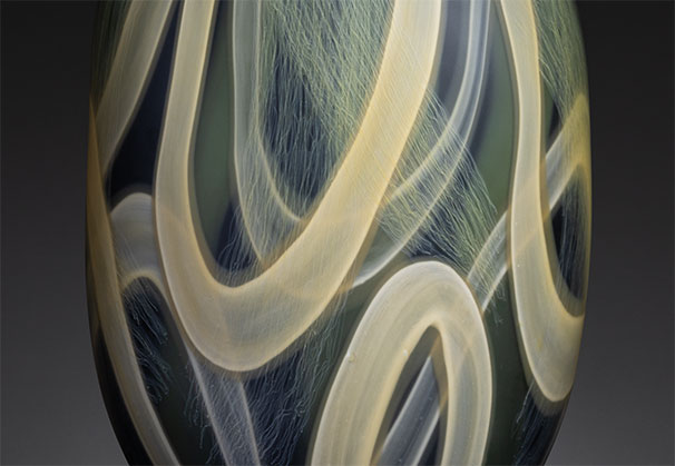 <i>Canopy, Layered Life #7</i>, 2026; 19 x 12.5 x 6.25 inches; blown glass with cane drawn additions, sandblasted, and pumice polished