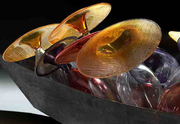 <i>Under Cover</i>, 2010; blown glass vessel with cold worked surface; 43-1/4 x 10 x 12 inches