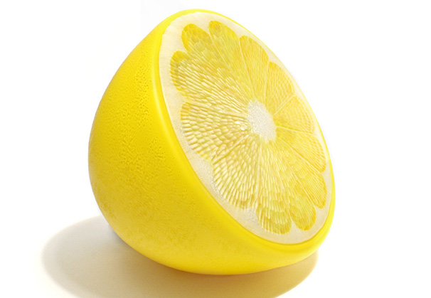 <i>Lemon Half</i>, 2023; 10 x 10 x 10 inches; blown and carved glass