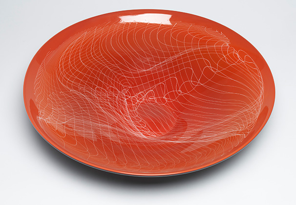 <i>Orange and Black Cane Bowl</i>, 2023; 4.5 x 17.5 x 17.5 inches; blown glass
