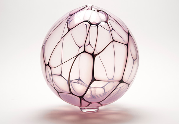 <i>Pink and Black Murrine Orb</i>, 2023; 11 x 11 x 11 inches; blown glass
