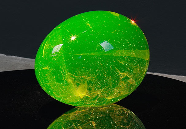 <i>Uran egg III 4/6</i>, 2020;
29.5 x 42.5 x 29.5 centimeters; uranium glass 
