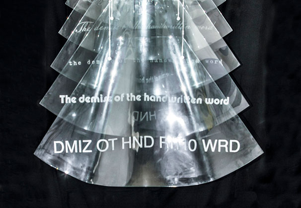 <i>The Demise of the Handwritten Word</i>, 2012; 100 x 60 x 60 cm; kiln-worked and sand-blasted glass with photo media