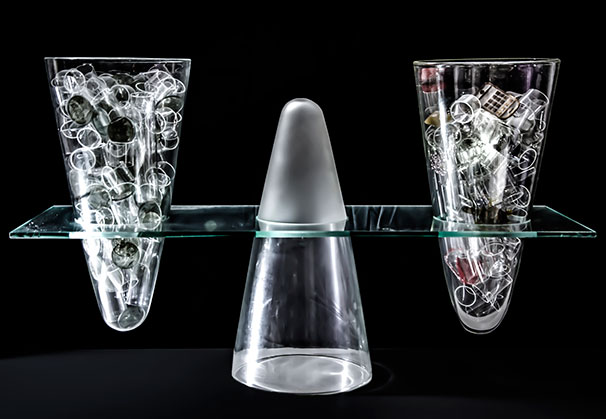 <i>Dollars and Sense</i>, 2012; 54 x 92 x 30 cm; blown, lampworked and cast glass with photo medium