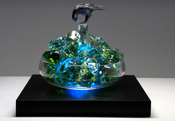 <i>Raven's Trance</i>; 54 x 23 x 23 inches; furnce cullet, float glass, steel, bronze, internal LED light source