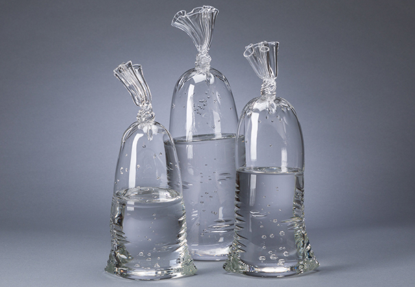 <i>H2O/Si02 Water Bags</i>; approximately 12 to 17 inches high x 5 to 6 inches wide; hollow and solid sculpted glass