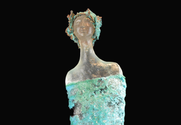 <i>Coming To The Surface</i>, 2024;  30 x 11 x 11 inches; pâte de verre and copper