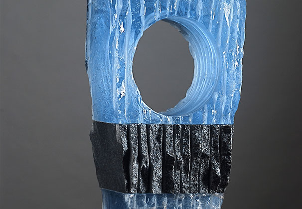<i>Awareness</i>; 22 x 7 x 4 inches; cast glass and granite
