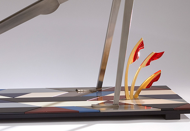 <i>Stretch</i>, Illuminated Sculpture, 2007; 37½ x 47 x 15 inches; fabricated, patinated, nickel and gold plated bronze. Blown glass shade. Anodized aluminum and Vitrolite mosaic base. Coldworked and lampworked glass details. Photo: Bill Truslow
