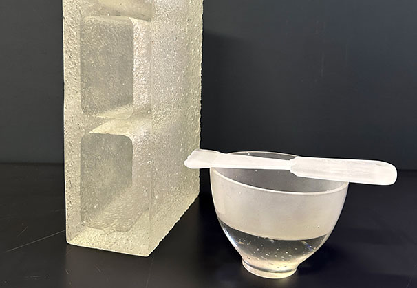 Untitled, 2025; Brick: 7.5 x 3.9 x 15.4, Bowl: 3.9 x 5.3, Scraper: 7.9 x 2 x 0.8 inch; lead crystal glass