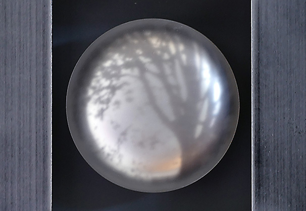 <i>Moon Tree</i>, 2021; 8 h x 8 w x 2 d (inches); original image, screen-printed kiln-fired enamels, blown, sandblasted, mirrored glass, steel with patina and paint
