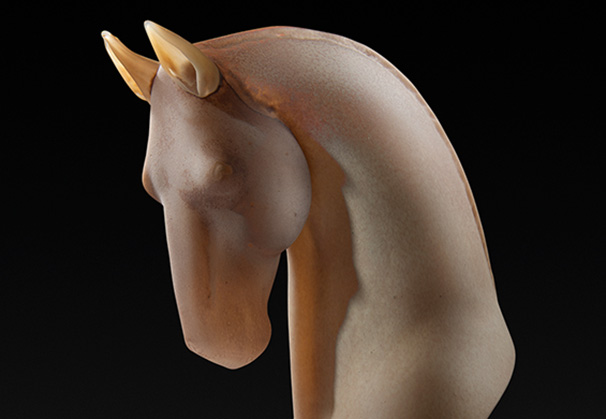<i>Hunter</i>, 2021; 17 x 6 x 9 inches, blown and hot sculpted glass. Photo by Dan Fox.