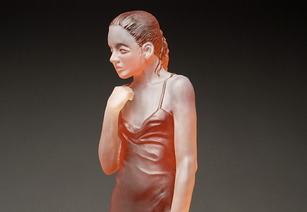 <i>Young Woman Standing</i>, 2010; 38 x 14 x 10 inches; cast glass and fabricated steel
