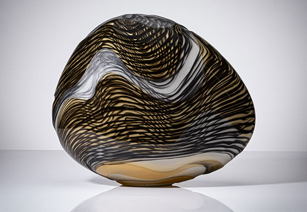 <i>River Stone Series I</i>, 2026; 340 x 380 x 150 millimeters; blown and carved glass. Photo Isobel Markus-Dunworth