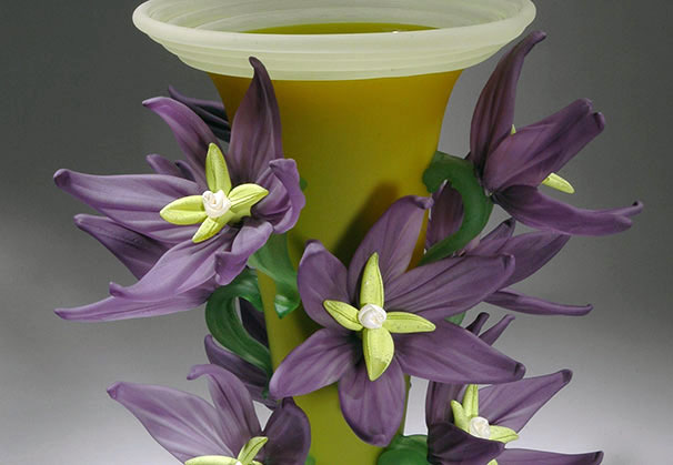 <i>Flower Vase Series, Purple Clematis 2014</i>; hand blown and solid worked glass, sandblasted surface, green with 9 purple clematis flowers; 13 x 12 x 12 inches