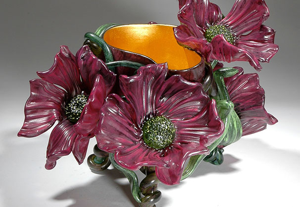 <i>Flowering Vine Vessel Series, VV10104, Pink Poppies 2010</i>; hand blown and solid worked glass, enamel, paint, 23K gold; 9.5 x 13 x 11 inches. 
