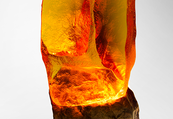 <i>Myriad</i>, 2015; 53 x 19 x 19 cm; yellow optical glass, limestone 
