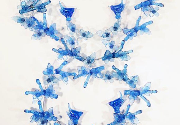 <i>Iridescent Blue Wrens with Dogwoods Figure Eight</i>; 66 x 46 x 5.5 inches; blown and hot formed glass