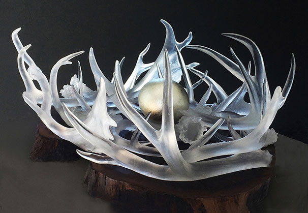 <i>Eagle's Nest</i>, 2019; 33 x 28 x 16 inches; cast crystal glass and white gold leaf egg