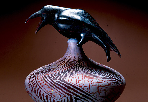 <i>Anasazi Pot with Crow</i>, 1999; 18 x 14 x 14 inches; blown glass, steel stand; featured in <i>William Morris: Myth, Object and the Animal</i>