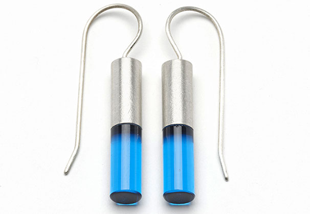 <i>Capsule earrings</i>; 40mm high x 6mm wide; coldworked glass, 925 silver
