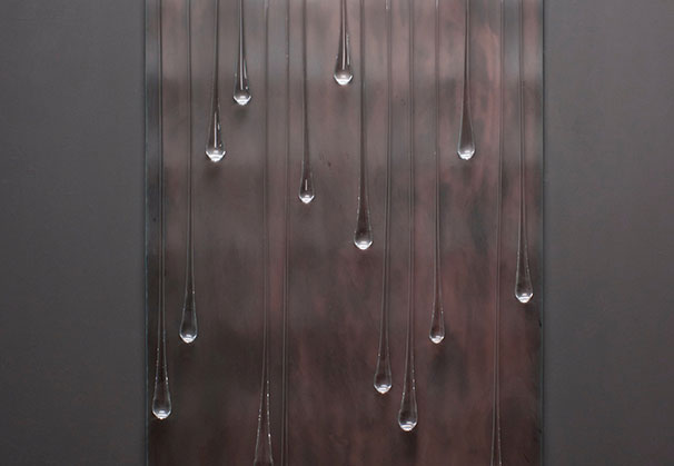<i>Darlin Run</i>, 2018; 65 x 32 inches; Plum Brown patina, bent and etched glass with drops suspended on mild steel armature

