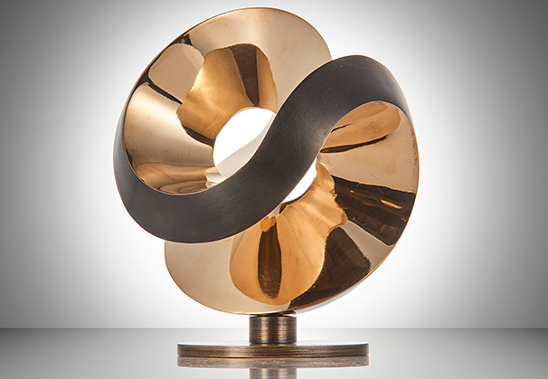 <i>Aqua One Bronze</i>, 2019; 13 centimeter diameter; bronze, patinated & polished