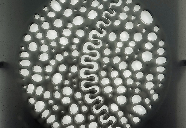 <i>In Touch 2, 2024</i>; , 23 x 23 inches; kiln-formed glass, aluminum standoffs