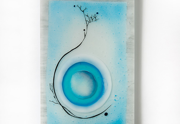 <i>Water Seed</i>, 2024; 10 x 20 inches; kiln-formed glass, aluminum standoffs