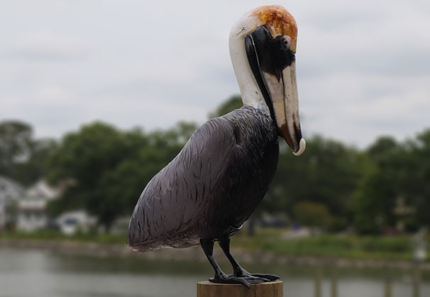 <i>The Watchful Steward</i>, 2025; 10 x 12 x 60; hot sculpted glass. Created for the Elizabeth River Project as an homage to the coastal life and environmental restoration efforts of the Chesapeake Bay region.