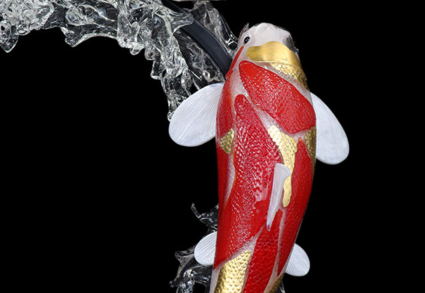 <i>Continuum</i>, 2024; 14 x 33 x 80 inches; hot sculpted glass. This custom sculpture was created for a new home in Bangkok, placed beside an indoor pond as a focal point of the space.