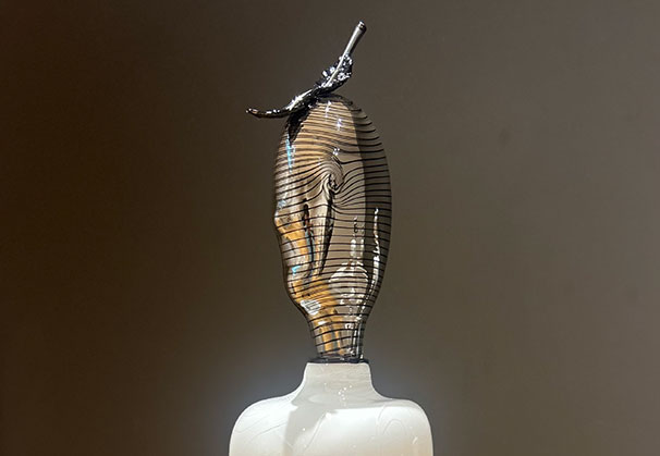 <i>Native Messenger III</i>, 2026; Blown, Hot Scultped, Etched and Mirrored Glass, Wood Base
