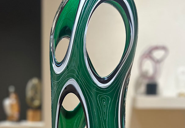 <i>Topo-Ruby Dilation</i>, 2026; Hot Sculpted, Oriental Wooden Base
 