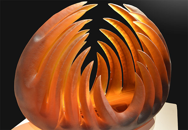 <i>Amber Bloom</i>; 16 x 8 x 12 inches; blown and sandblasted glass