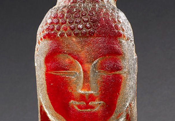 <i>Red Mini Buddha</i>; 10 x 4 x 4 inches; sand cast glass with hand forged metal stand